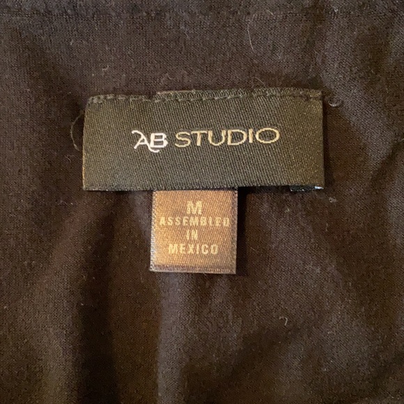 Floral pattern shear poncho with attached black tank top. - Picture 3 of 3